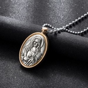 Oceľový medailón Panny Márie zlatej farby